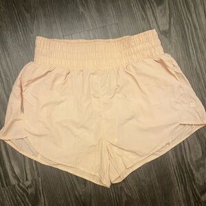 light pink running shorts